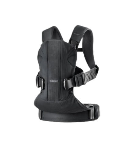 Black BabyBjörn Carrier One Cotton baby carrier front view showing ergonomic design, padded shoulder straps, and adjustable buckles for newborn to toddler carry.