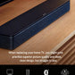 The Bose TV Speaker in a living room setting with icons summarizing its key features: enhances TV sound, includes a Bluetooth remote, supports A2DP Bluetooth, and is expandable with an optional Bose wireless speaker.