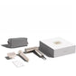  Everything included in the Dreame Pocket hair dryer box: the foldable dryer, a styling nozzle, a travel pouch, and the product packaging.